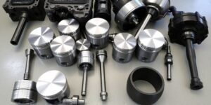 several engine pistons and piston rods